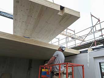 Brandschutzbemessung für geklebte Holzteile optimiert